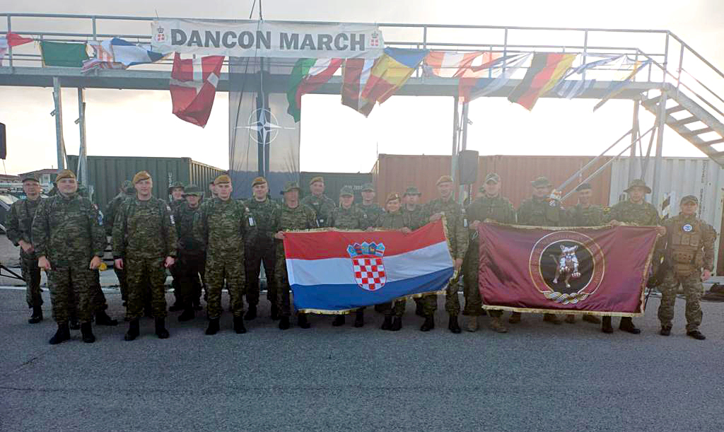 Slika https://www.morh.hr/wp-content/uploads/2023/04/2023-04-04-pripadnici-38-hrvcon-a-u-kfor-u-na-hodnji-dancon-march-n.jpg